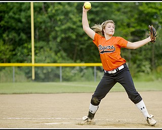 6.16.2009
Howland's Abagael Nicholas (2) pitches at Candlelite Knolls in Bazetta Ohio on Tuesday afternoon.
Photo by: Geoffrey Hauschild