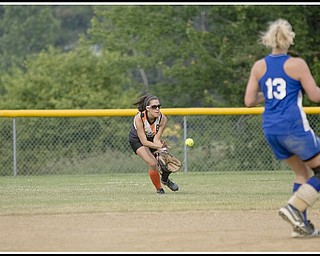 6.16.2009
Southington's Brittany Nieves makes a catch at Candlelite Knolls in Bazetta Ohio on Tuesday afternoon.
Photo by: Geoffrey Hauschild