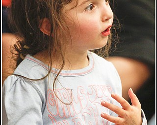 Katina Ticoras (3) of Howland sings along to Chip Richter as he performs in the Media Room at Hubbard Local Library Monday June 15, 2009
Photo by: Lisa-Ann Ishihara