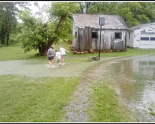 6.17.2009
Flooding in Ellsworth, Ohio.
Photo provided to The Vindicator by Joanne Simon.