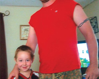 Dan Kurpely, 25, and Kane, 5, of East Liverpool.
