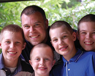 Jeff Thomas with his four sons, from left, Cory, 15; Andrew, 8; Ethan, 11; and Kyle, 13.

