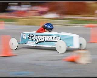 6.20.2009
Lacy Neri, a 3rd grader from Niles, races down 5th Ave. during The 2009 Greater Youngstown Area Soap Box Derby on Saturday afternoon.
Geoffrey Hauschild