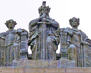 The three statues represent Justice, left, Strength and Authority, center, and Law. A 1957 cleaning rediscovered their names.