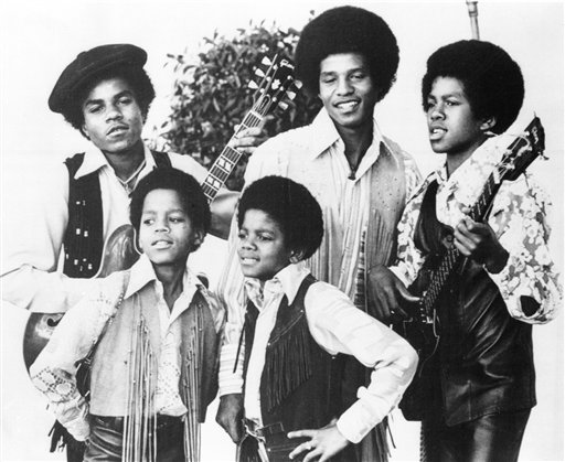 FILE - In this undated file photo, the Jackson 5, Michael Jackson, front right, Marlon Jackson, front left, Tito Jackson, back left, Jackie Jackson and Jermaine, back right, are shown in Los Angeles.  (AP Photo, file)