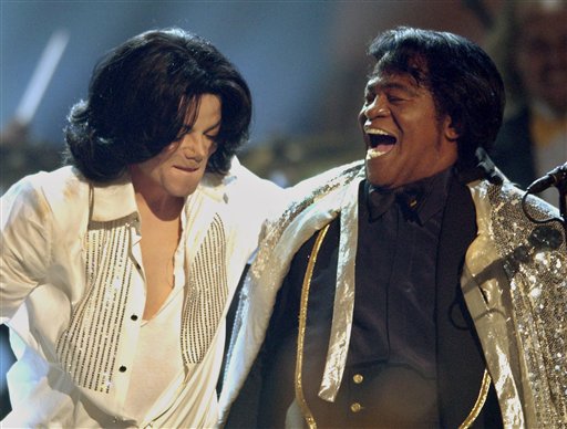 FILE - In this Tuesday, June 24, 2003 file picture, Michael Jackson, left, performs with James Brown during the BET Awards in Los Angeles. Jackson later presented Brown with a  lifetime achievement award. Jackson has died in Los Angeles at age 50 on Thursday, June 25, 2009. (AP Photo/Kevork Djansezian)