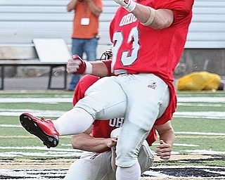 ALL STAR - Josh Harold of Columbiana watches his 54 yard field goal sail through the up rights Friday night. - Special to The Vindicator/Nick Mays