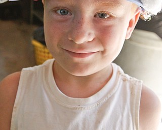 Michael Byers (7) of Girard shows off his newly decorated visor at summer day camp in Churchill Park in Liberty run by Rose Buhley, Monday June 29, 2009
Lisa-Ann Ishihara