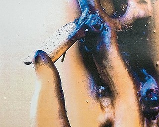 CLOSER LOOK: A close-up angle of a hook is among Kathryn Infante’s artwork, on display in the administration building in Liberty.