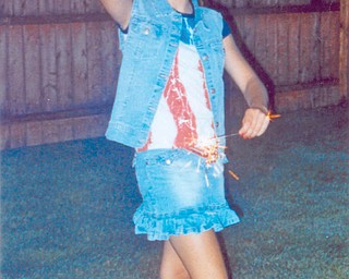 Carly Conklin of Lowellville was 13 when she celebrated the Fourth of July in 2006 at the home of Jill and Joe Cole of Boardman.