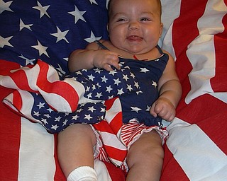 Olivia Carfolo was just 4 months old when this picture was taken July 4, 2003, at her grandparents’ cottage in Conneaut Lake Park, Conneaut, Pa