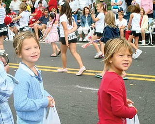 Got candy? Emily Yasechko, left, and Nicole Yasechko of New Middletown are attending the Canfield parade.