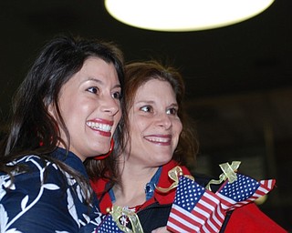 Sisters Justine M. Petracci Lawson of San Diego, formerly of Campbell, and Janeen Petracci Suverison of Boardman await the arrival of Justine’s husband, Christopher, who was returning home fron Afghanistan a year ago.
