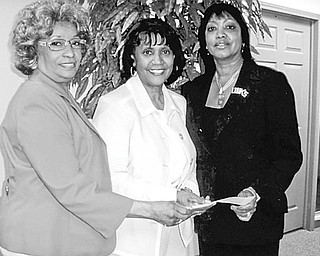 <p>Special to The Vindicator</p>
<p>LINKED: The Links, Incorporated, President Anne R. Cobbin, left, and social committee chair Marge Staples, right, present a $1,850 check to Lois Clark, Headstart program director, center.</p>