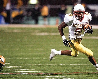 Braylon Heard breaks away from Harding's Desmond Reed (9) as Braylon heads for the endzone during first half action as Mooney shut out Harding in Warren 17-0 in 2008.