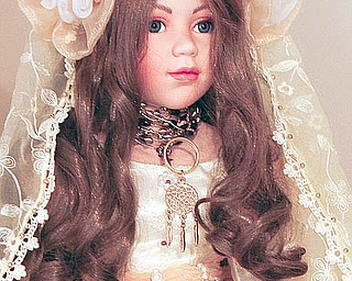 An indian doll - part of Stella Camuso has an entire room that houses her extensive bride-doll collection, as well as framed wedding stories. - robertkyosay