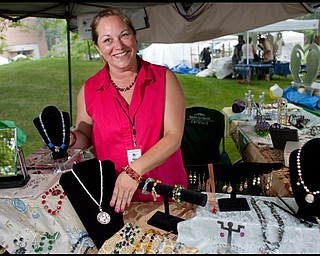7.11.2009
Kim Mizerak, of Madison OH, displays her wares at her booth catering "A Vintage Advantage Jewelry" on YSU's campus during the YSU Festival of the Arts on Saturday afternoon.
Geoffrey Hauschild