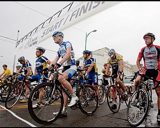 7.11.2009
Racers wait for the start of the masters class race on S Main St. in Columbiana during the Tour of the Valley on Saturday afternoon.
Geoffrey Hauschild