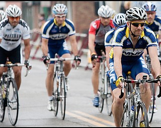 7.11.2009
Robert Vogt, a resident of Salem and team member of the Mahoning Valley Cyclists, takes off on the Masters class race along S Main St in Columbiana during the Tour of the Valley on Saturday afternoon.
Geoffrey Hauschild