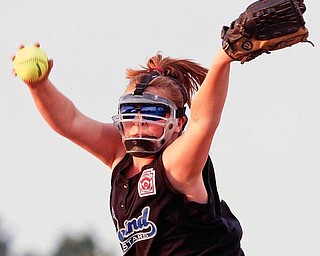Poland's Chloe Bush pitches to Howland at the Field of Dreams.