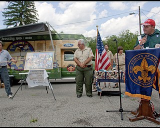 7.16.2009
Tony Jones, of Michigan, introduces scouts at Camp Stambaugh on Thursday afternoon, to those who appear on the 100 year commemorative mural, "A Century of Values," traveling to all Scout Camps across the country.
Geoffrey Hauschild