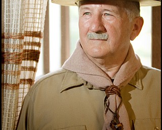 7.16.2009
Bill Moss, dressed as Robert Baden-Powell, the founder of the Boy Scouts, poses for a portrait in his museum of Boy Scout memorabilia that was recently completed at Camp Stambaugh.
Geoffrey Hauschild