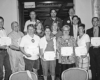 Special to The Vindicator
ATTENDANCE AWARDS: At the end of the fourth quarter on July 1 the Rotary Club of Austintown recognized a number of members who achieved perfect attendance. Receiving attendance awards certificates were, from left, first row, Brian Frederic, Tony Cebrial, Karl Rein, Deanna Spirko, Robin Stock, Hillary Prestridge and Brian Laraway; second row, Susan Leetch, Melissa Crowley, and Dr. Mitch Dalvin; and third row, Ron Carroll, Dr. Mike Cafaro and Chuck Baker. Other perfect attendance members, not pictured, are Dave Buttar, Beverly Flowers, Leanna Mathes, Brian Pretoka and Gary Reel.
