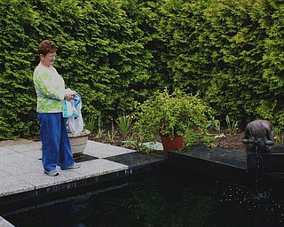 Elizabeth DeAngelo takes in the statue. She's been a Gardens guest for years but just recently discovered the fountain.