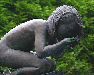 There is an angel-child hidden in the Valley. Every day she kneels above her pool at Fellows Riverside Gardens and sips eternally.