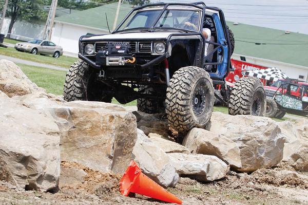 Terry Cunningham of Enon Valley, Pa. participates in the Rock Crawl for the Truck and Jeep Fest at Canfield Fairgrounds, Saturday July 25, 2009.
