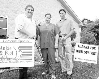 The Vindicator/Robert K. Yosay
FORE WORD: Looking forward to the Annual American Diabetes Association Golf Benefit, sponsored by Ankle & Foot Care Centers, are, left to right, Dr. John Chiaro, Dr. Michelle Anania and Michael Vallas.