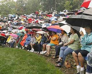 Retirees Unite, Packard hourly retirees group, is meeting to rally the troops against pension cuts- at the Amphitheater in Warren - the pensioners braved the rain to hear from leaders including Jim Graham - John Arbogast etc - robertkyosay