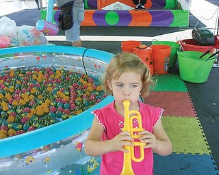 Anna Perticarini of North Canton, granddaughter of Antoinette Dobos of Youngstown, was having fun at St. Christine Festival this summer.
