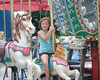 Sophia Perticarini of North Canton was at the St. Christine Festival this summer with her grandma, Antoinette Dobos of Youngstown.