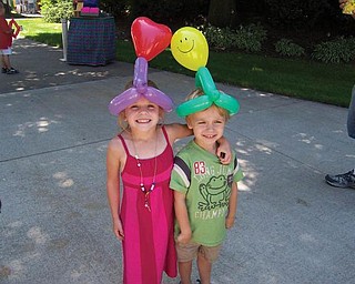Olivia and Matthew Rossi of Austintown are having fun at the YSU Festival of the Arts.