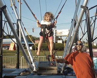 Brooklyn Ciminero, 2 1/2, of Liberty Township was a litte daredevil at the Southern Park Mall Memorial Day weekend festival.