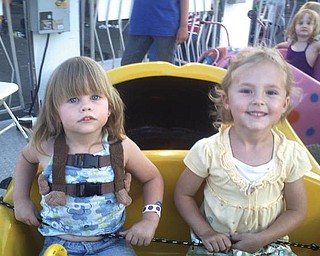From left, Summer Swiskoski and Avery Rosko, both of Cornersburg, are having a ball at the St. Christine's Festival. Summer is the daughter of Jimmy and Shannon Swiskoski. and Avery is the daughter of Eric and Lisa Rosko.