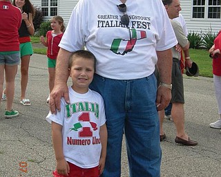 Sean McKim of New Middletown with his grandpa, Greater Youngstown Italian Fest Chairman Ray Greco share the fun at the Italian Fest in downtown Youngstown.