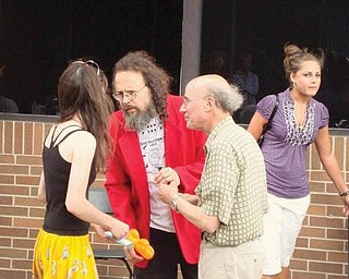 Jim Villani and Dr Ray Beiersdorfer (red coat) are pictured at the Pig Iron Fest.