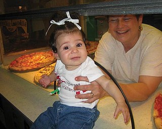 Gisella Anita Angiuli poses for a picture taken by her mother, Melanie Angiuli, on July 26 at the Mount Carmel Italian Festival. Her shirt says 'Principessa Italiana,' meaning Italian Princess in Italian.