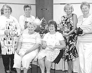 Special to The Vindicator
TEA TIME: For a fundraising tea in the Community Room of the Hubbard Public Library, the Harding Park Meeting House Building Committee had transformed the room into an elegant tea house for a sold out crowd. The community’s support for the July 18 event moves the building committee closer to its goal of resurrecting the historic 1857 Presbyterian Meeting House in Harding Park. The planned Harding Park Meeting House will be the site for quaint, picturesque weddings and community social events. Committee members, seated from left to right, are Sue Lambert and Judy Jendrasiak; and standing, Linda Clark, Mary Buchenic, Judy Ruby, and Jo Anne Cutter.