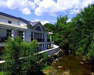 Creek side view of the library from the Main Street Bridge