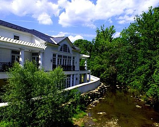 Creek side view of the library from the Main Street Bridge