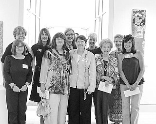 Special to The Vindicator
WOMEN ARTISTS: Among the women artists competing in the YWCA’s 27 annual Women Artists: A Celebration art show and attending the patron’s party, where they received awards, are from left at back, Elaine Green, Karen St. John-Vincent, Maryanne Caleris, Nan Buchanan and Marianne Whitehouse, and in front, Gail Trunick, Rochelle N. Krok, Jo Ann Buzulencia, Mary Kay D’lsa and Merle Bouffard.                               