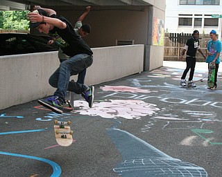 Skateboarders take advantage of David Grohl Alley in Warren.
