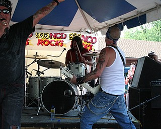 Dave Grohl performs with Love Turns Hate at the David Grohl Alley dedication ceremony
