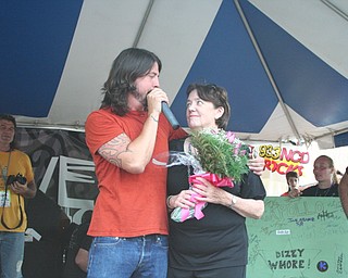 Dave Grohl with his mother, Virginia Grohl, at the David Grohl Alley dedication ceremony in Warren.