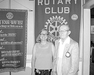 Special to The Vindicator
PERFECT ATTENDANCE: During a recent meeting of Youngstown Rotary Club, Mary Womble, club president, took the opportunity to congratulate Henry Bertolini, who was recognized for his 62 years of perfect attendance at club meetings.