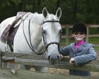 Madelynn Felgar on - TOMMY - at their Beloit home - robertkyosay