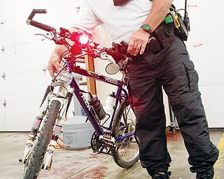 Sgt. Ken Goist of the New Middletown Police Department is the only member of the bike patrol.